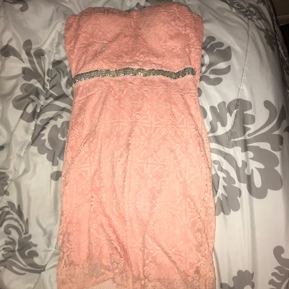 It’s a beautiful coral lace dress!